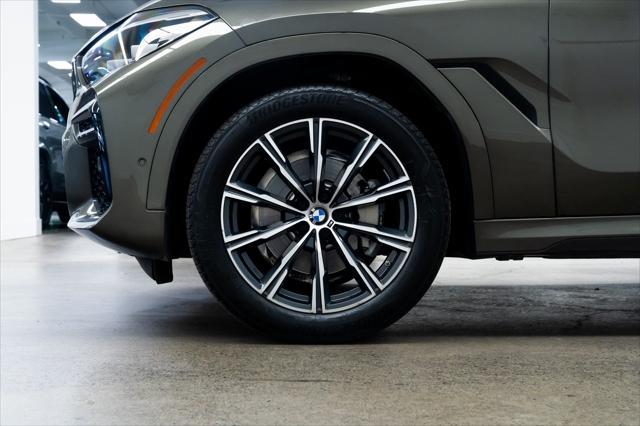 used 2022 BMW X6 car, priced at $57,990