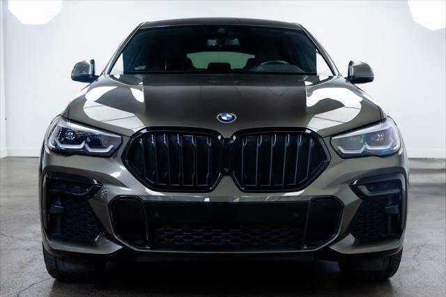 used 2022 BMW X6 car, priced at $57,990