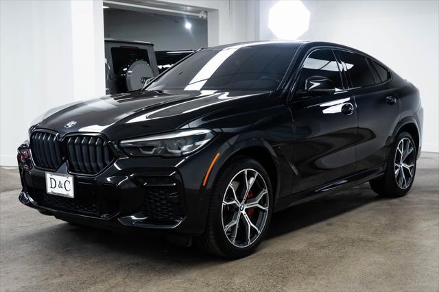 used 2022 BMW X6 car, priced at $56,990