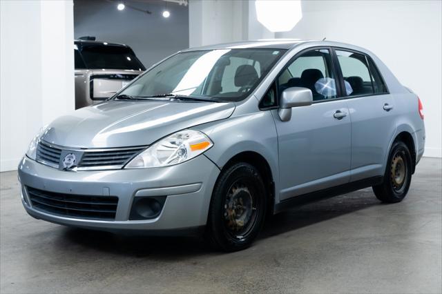 used 2009 Nissan Versa car, priced at $3,990