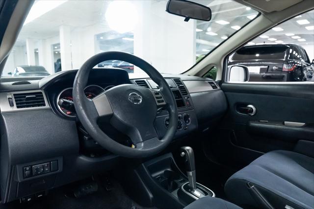 used 2009 Nissan Versa car, priced at $3,990
