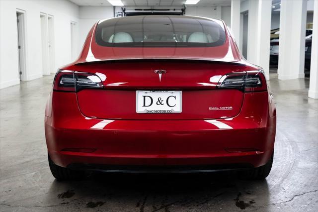 used 2022 Tesla Model 3 car, priced at $33,590