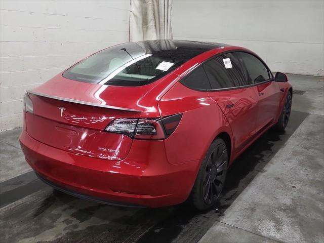 used 2022 Tesla Model 3 car, priced at $34,990