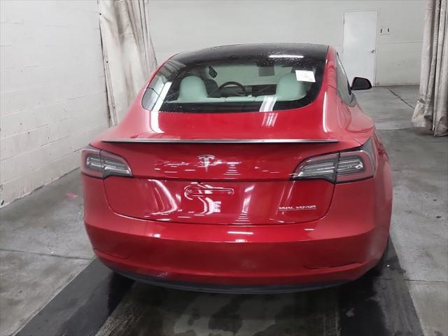 used 2022 Tesla Model 3 car, priced at $34,990