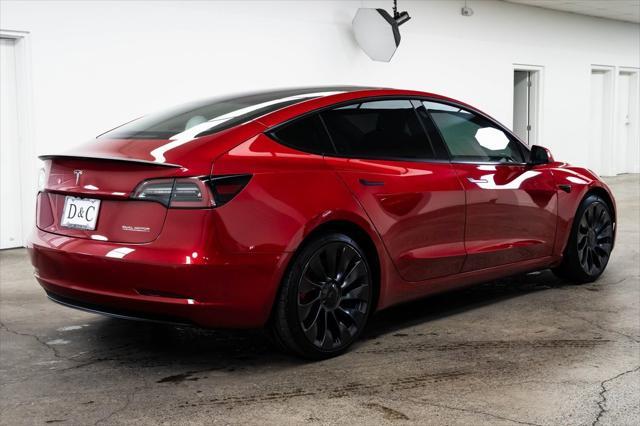 used 2022 Tesla Model 3 car, priced at $33,590