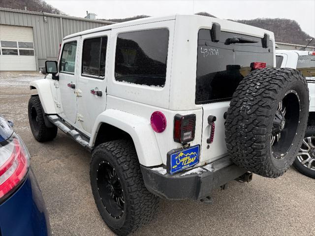 used 2014 Jeep Wrangler Unlimited car, priced at $12,995