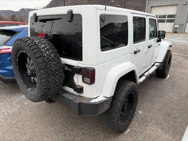 used 2014 Jeep Wrangler Unlimited car, priced at $12,995