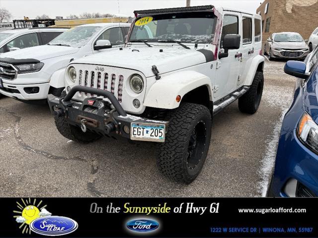 used 2014 Jeep Wrangler Unlimited car, priced at $12,995