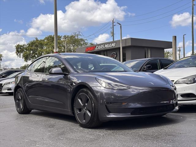 used 2023 Tesla Model 3 car, priced at $22,495