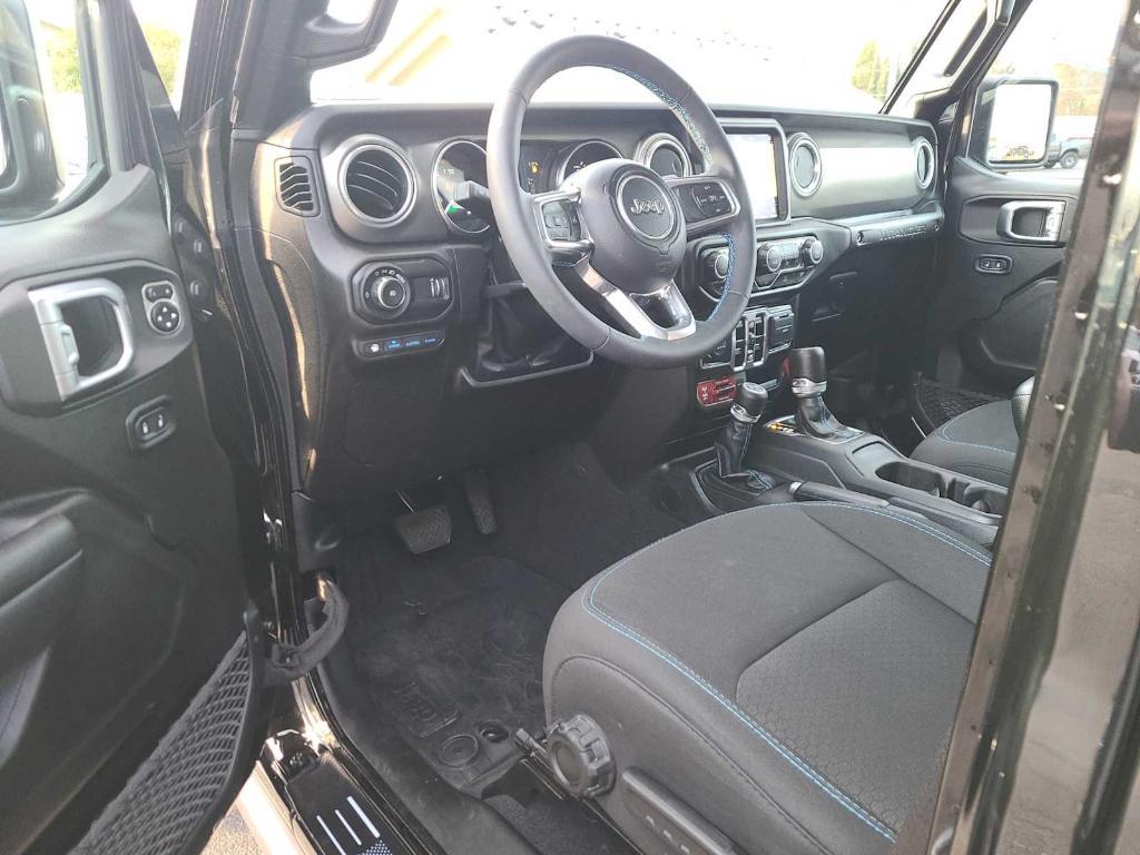 used 2023 Jeep Wrangler 4xe car, priced at $38,304