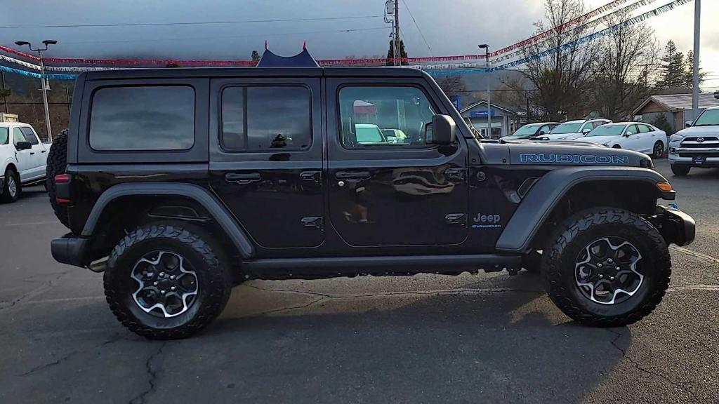 used 2023 Jeep Wrangler 4xe car, priced at $38,304