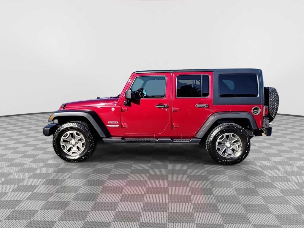 used 2011 Jeep Wrangler Unlimited car, priced at $9,982