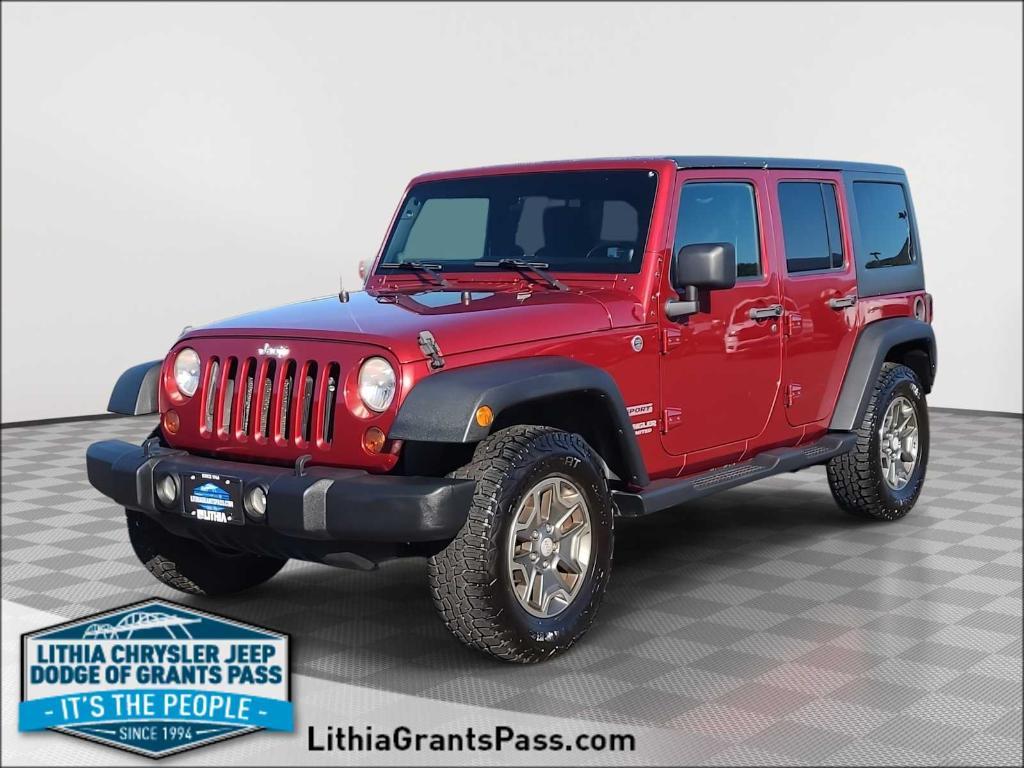 used 2011 Jeep Wrangler Unlimited car, priced at $11,998