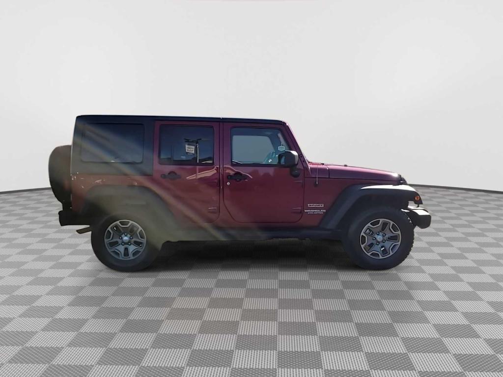 used 2011 Jeep Wrangler Unlimited car, priced at $9,982