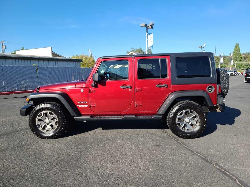 used 2011 Jeep Wrangler Unlimited car, priced at $9,982