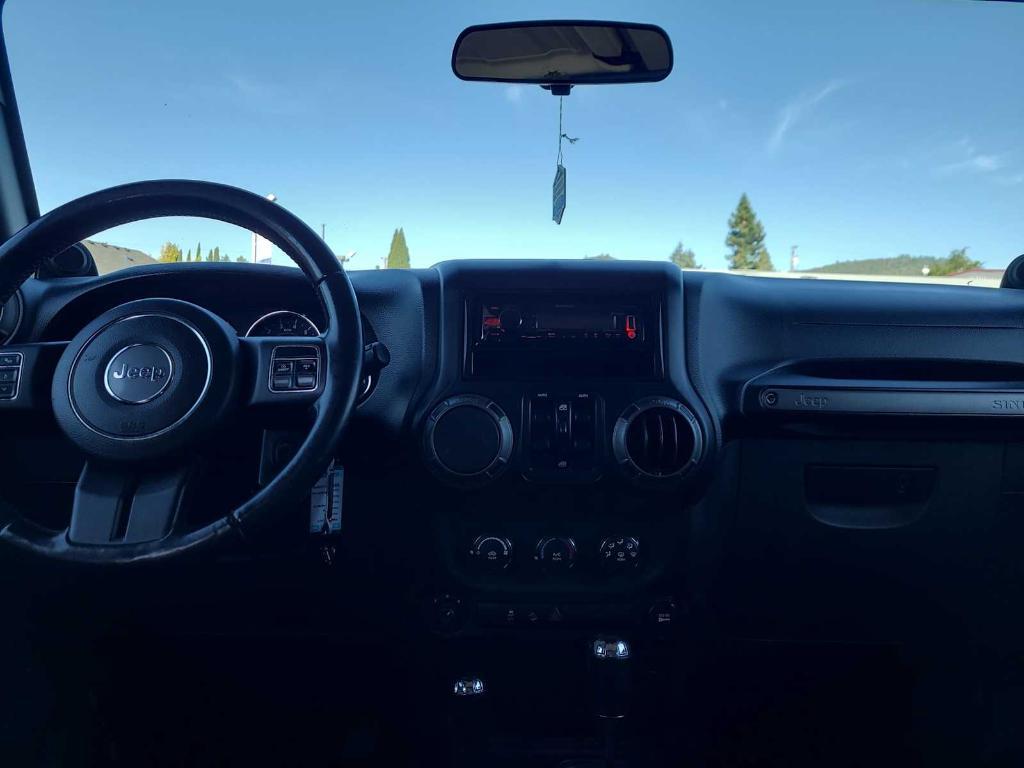used 2011 Jeep Wrangler Unlimited car, priced at $9,982