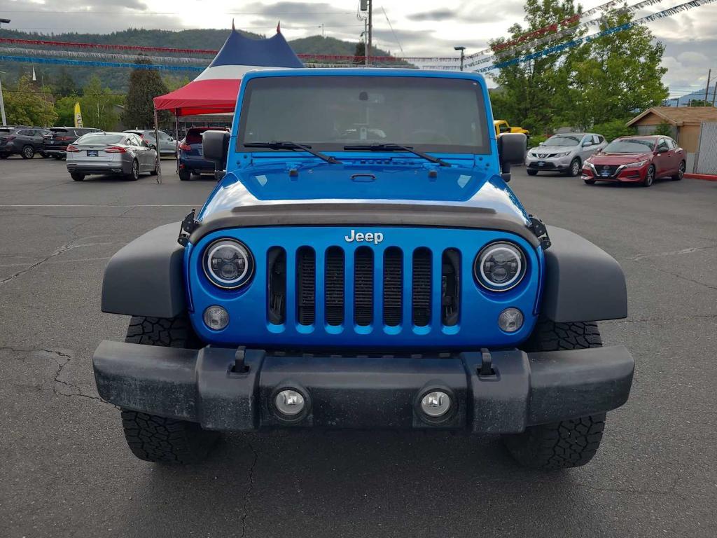 used 2015 Jeep Wrangler Unlimited car, priced at $22,430