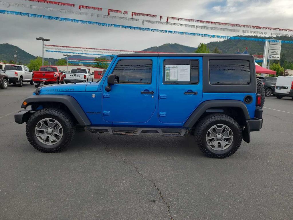 used 2015 Jeep Wrangler Unlimited car, priced at $22,430