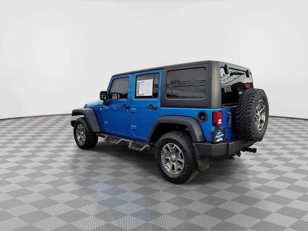 used 2015 Jeep Wrangler Unlimited car, priced at $22,430