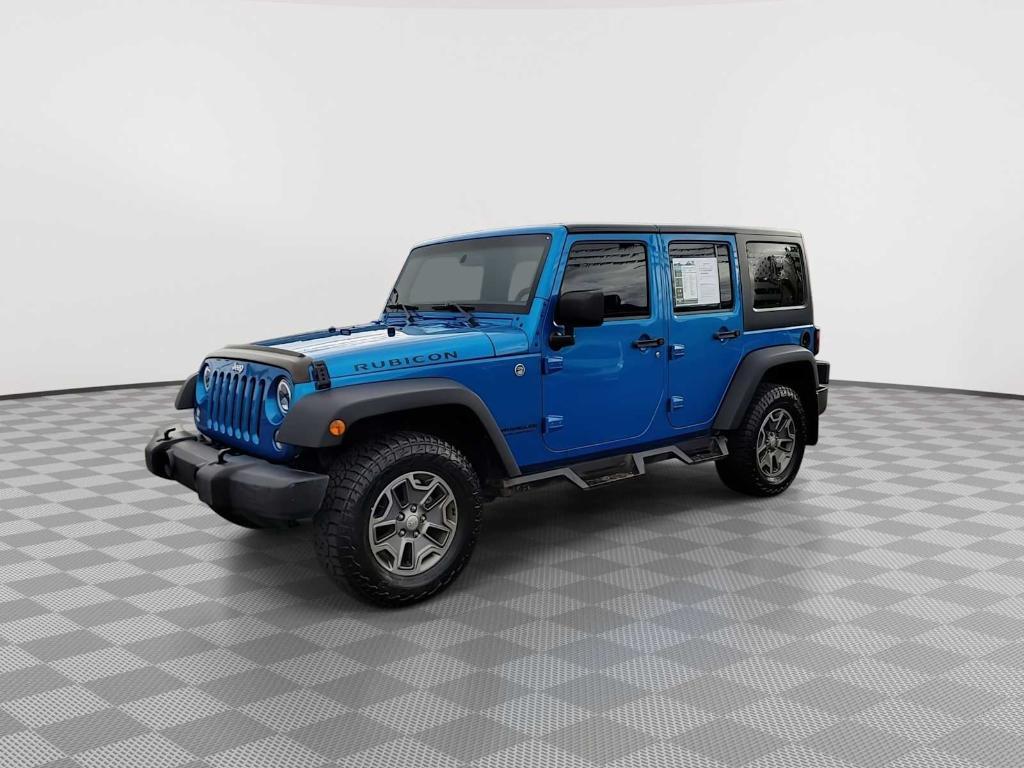 used 2015 Jeep Wrangler Unlimited car, priced at $22,430