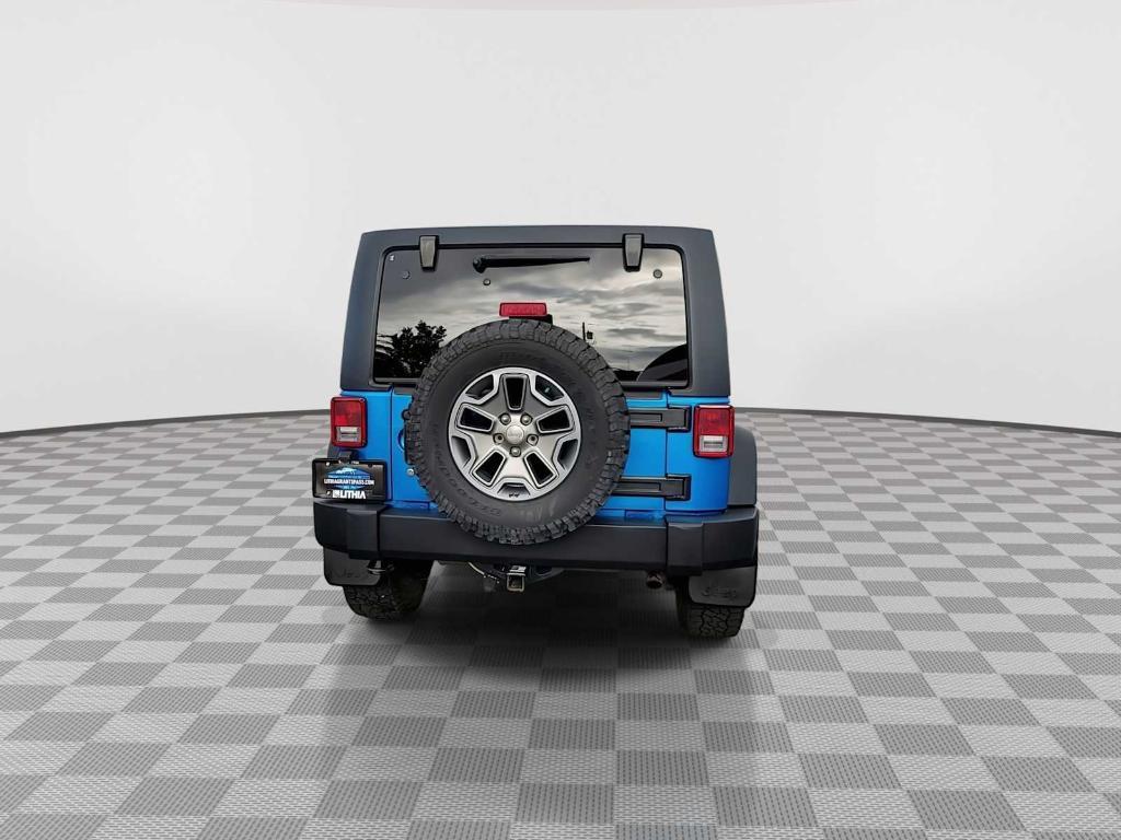 used 2015 Jeep Wrangler Unlimited car, priced at $22,430