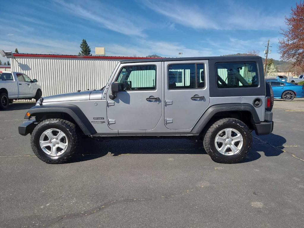 used 2018 Jeep Wrangler JK Unlimited car, priced at $19,942