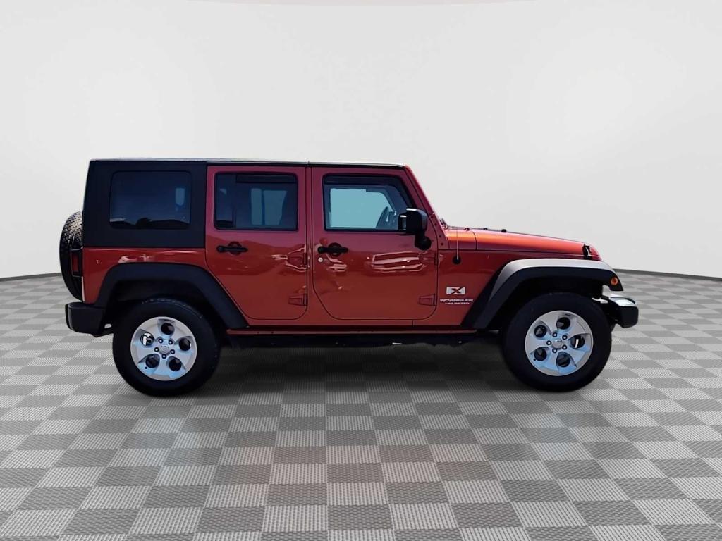 used 2009 Jeep Wrangler Unlimited car, priced at $15,247