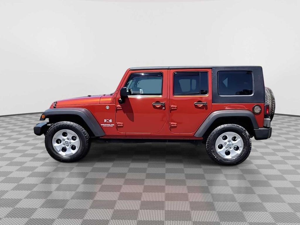 used 2009 Jeep Wrangler Unlimited car, priced at $15,247