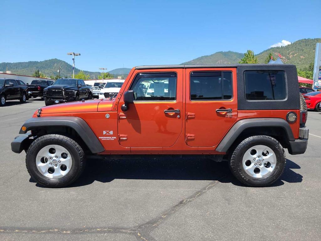 used 2009 Jeep Wrangler Unlimited car, priced at $15,247