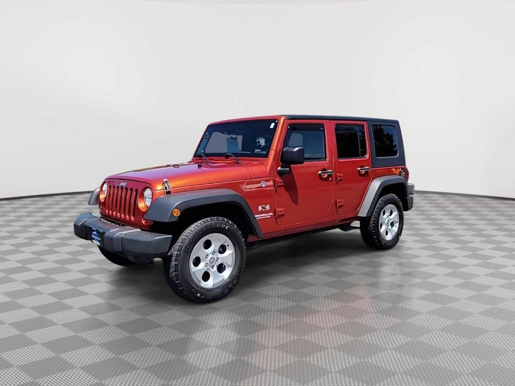 used 2009 Jeep Wrangler Unlimited car, priced at $15,247