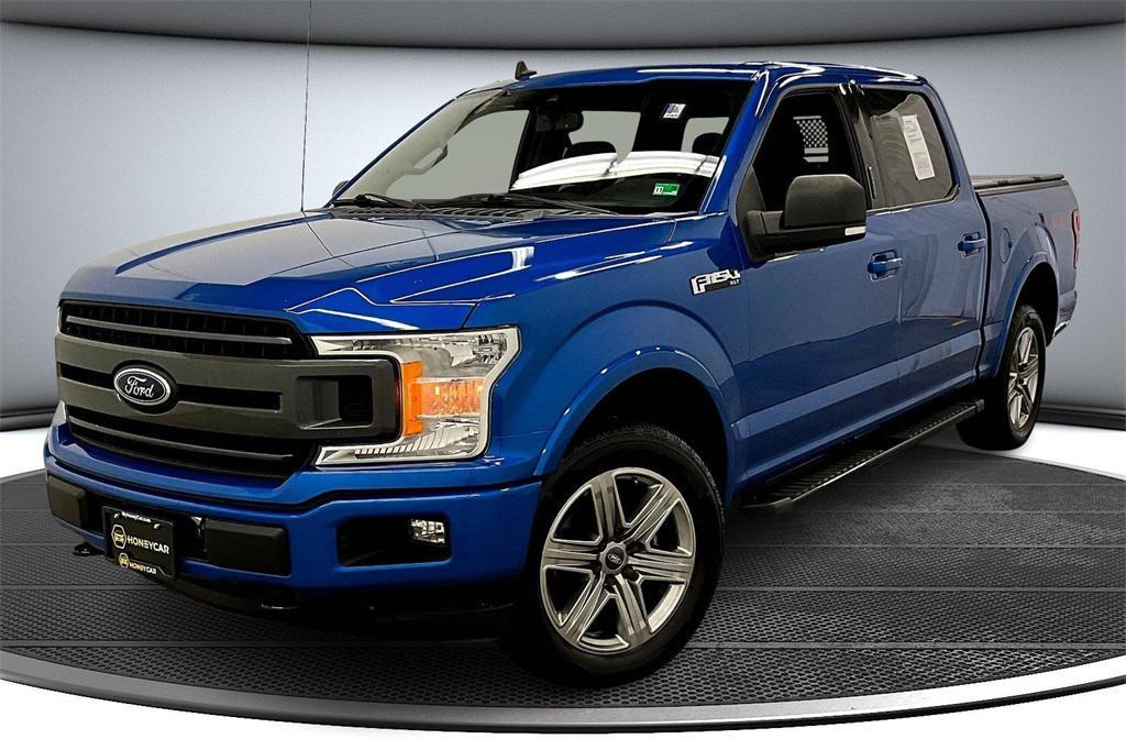 used 2019 Ford F-150 car, priced at $26,329