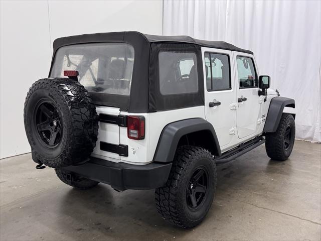 used 2018 Jeep Wrangler JK Unlimited car, priced at $23,599