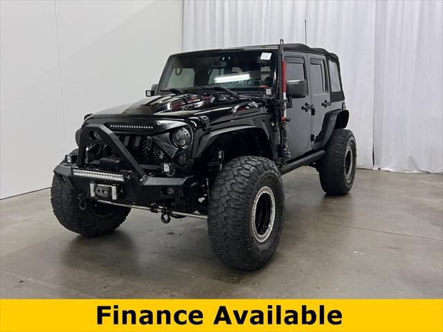 used 2016 Jeep Wrangler Unlimited car, priced at $24,394