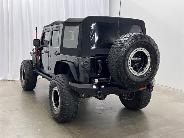 used 2016 Jeep Wrangler Unlimited car, priced at $24,394