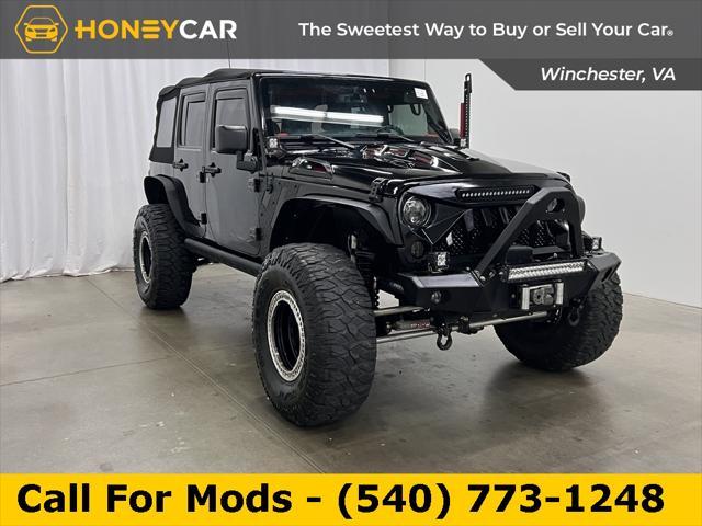 used 2016 Jeep Wrangler Unlimited car, priced at $24,394