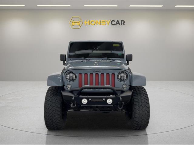 used 2014 Jeep Wrangler Unlimited car, priced at $17,794