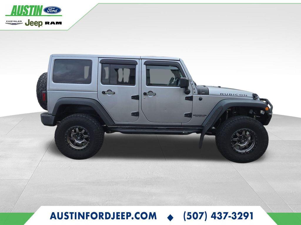 used 2014 Jeep Wrangler Unlimited car, priced at $17,990