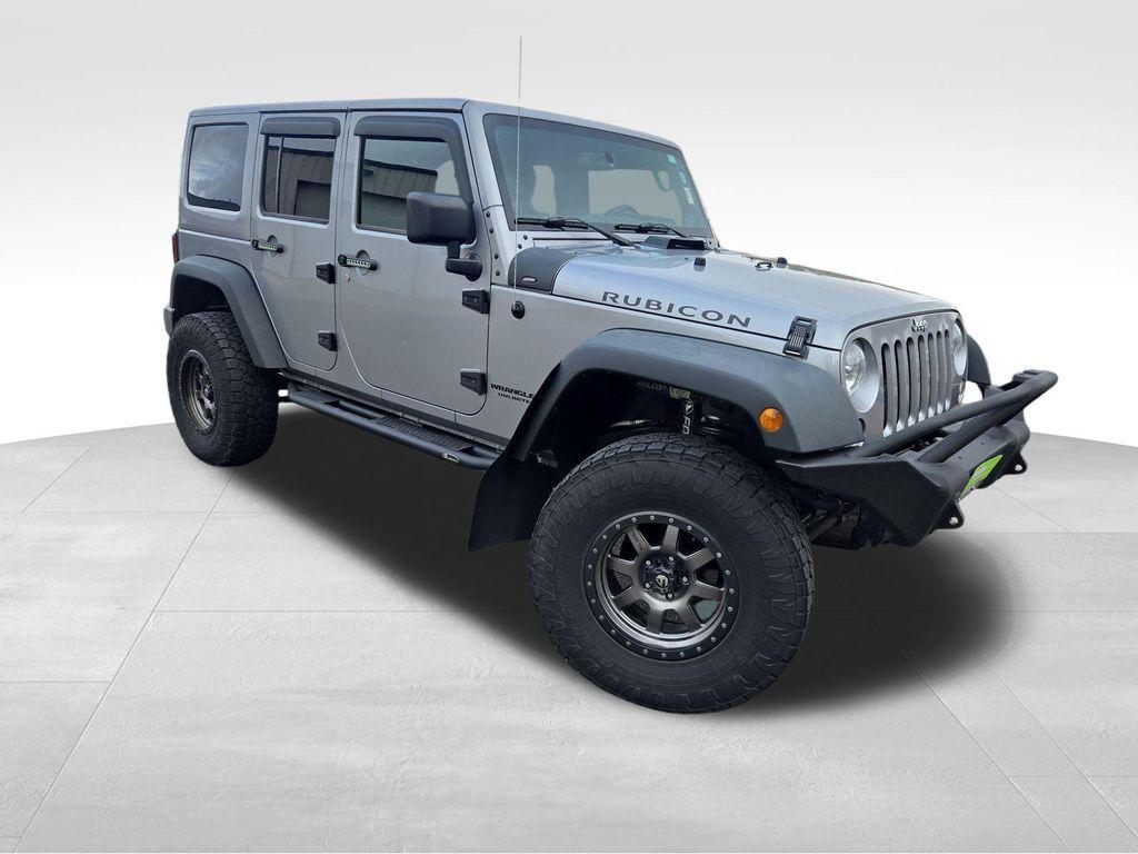 used 2014 Jeep Wrangler Unlimited car, priced at $17,990