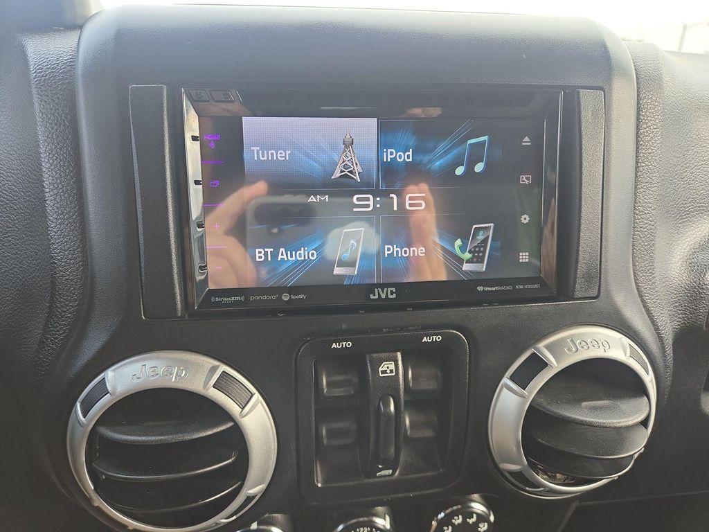 used 2014 Jeep Wrangler Unlimited car, priced at $17,990