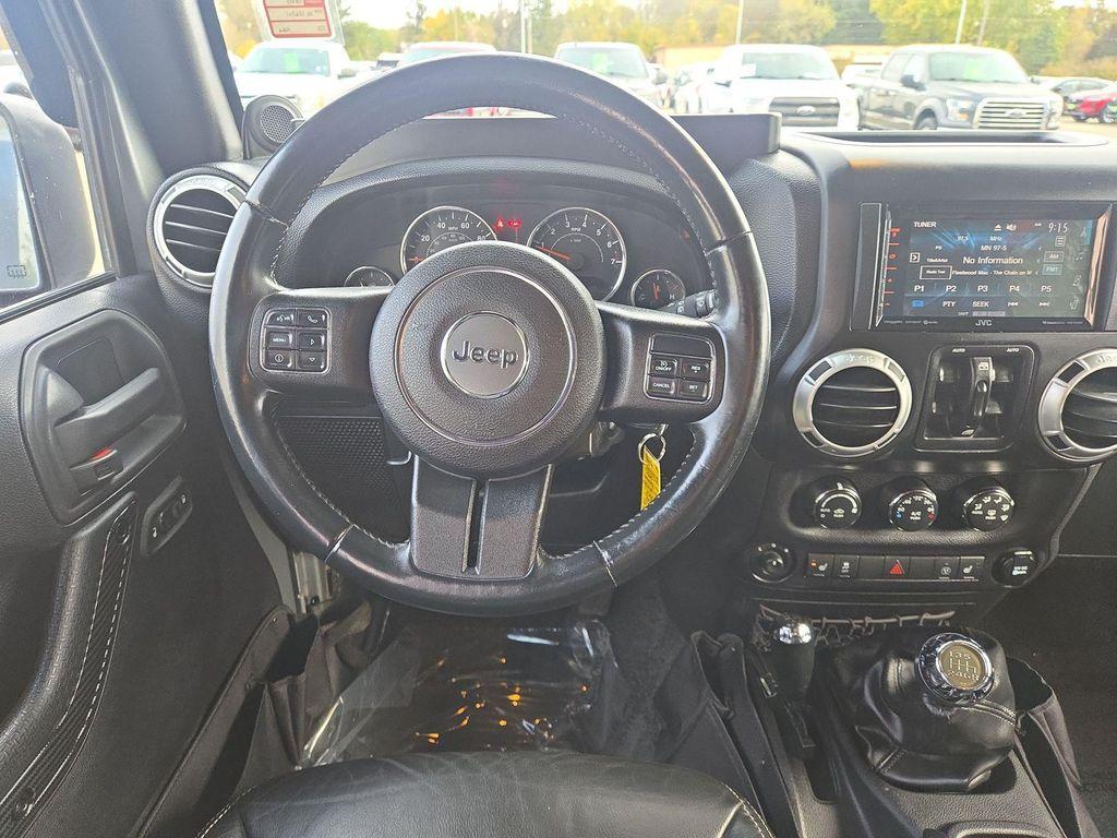 used 2014 Jeep Wrangler Unlimited car, priced at $17,990