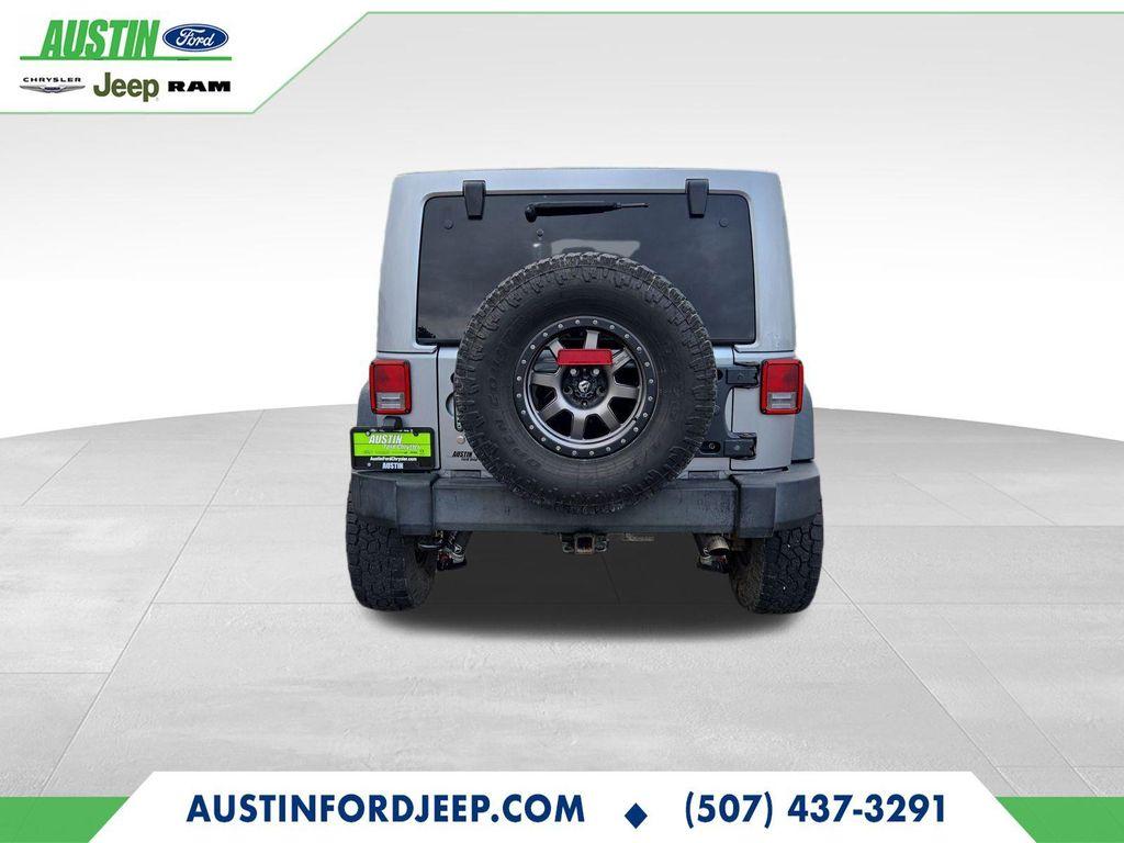 used 2014 Jeep Wrangler Unlimited car, priced at $17,990