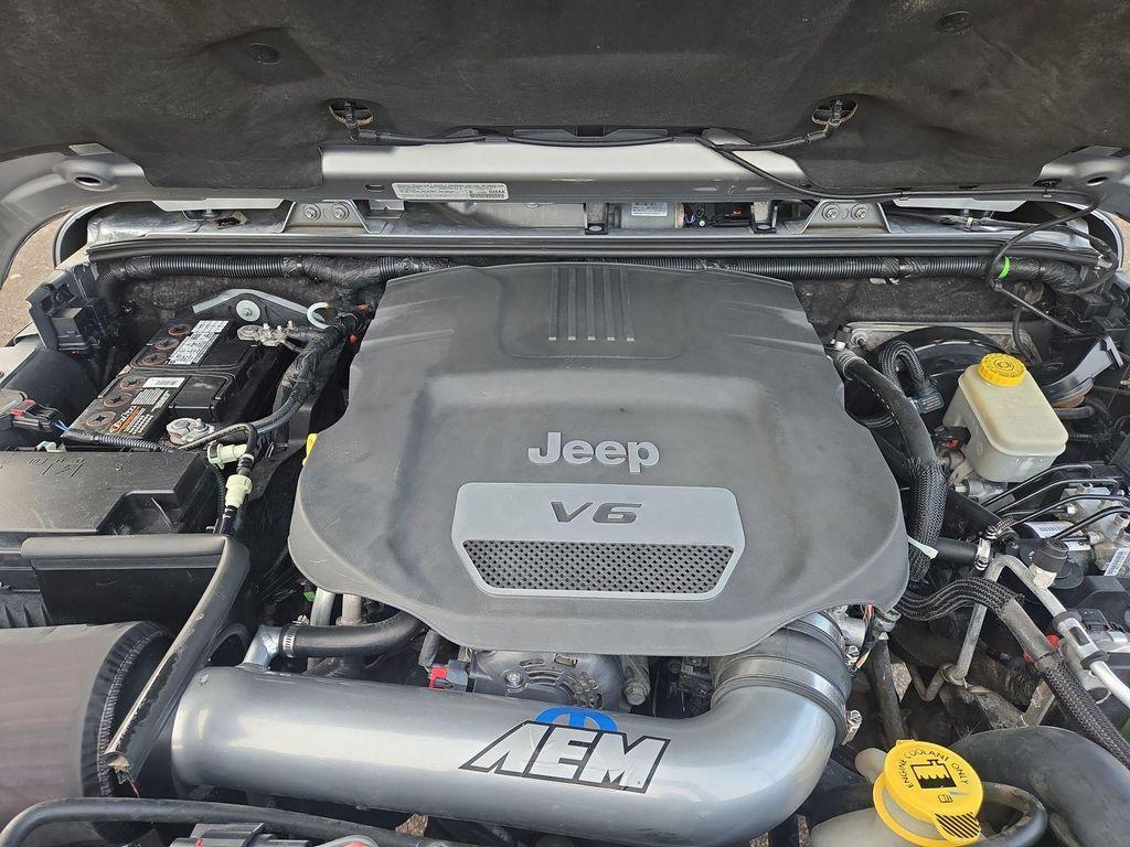 used 2014 Jeep Wrangler Unlimited car, priced at $17,990