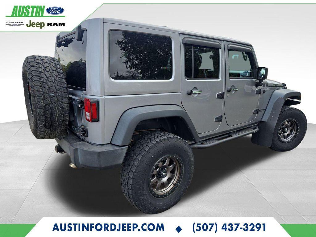 used 2014 Jeep Wrangler Unlimited car, priced at $17,990