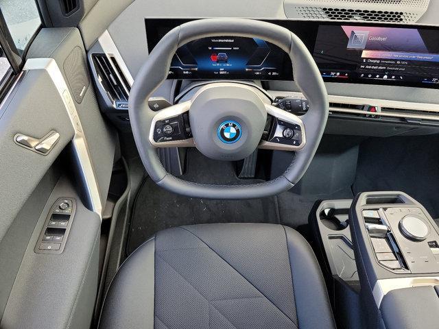 new 2025 BMW iX car, priced at $97,020