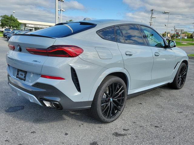 new 2025 BMW X6 car, priced at $88,075