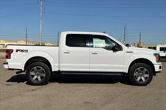 used 2019 Ford F-150 car, priced at $23,488