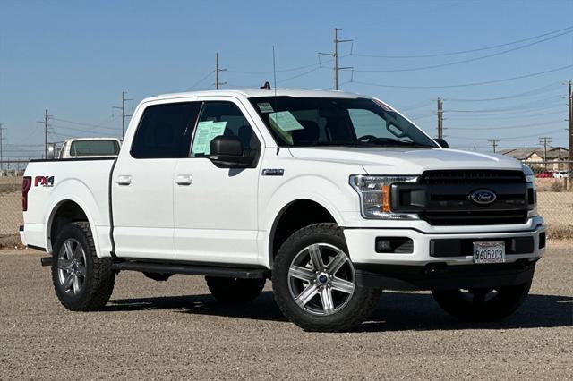 used 2019 Ford F-150 car, priced at $23,488