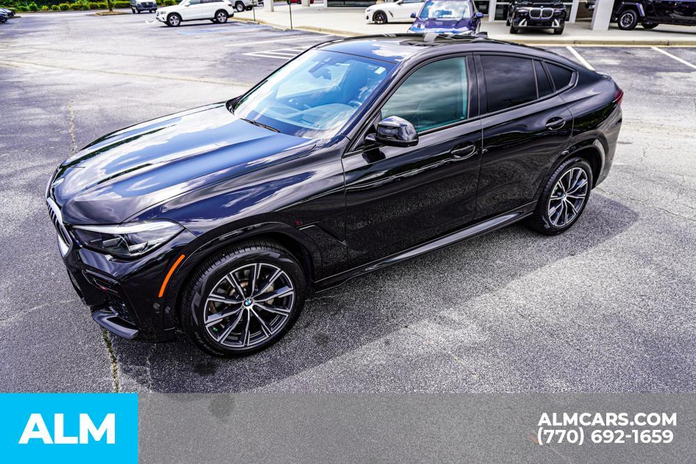 used 2023 BMW X6 car, priced at $53,920