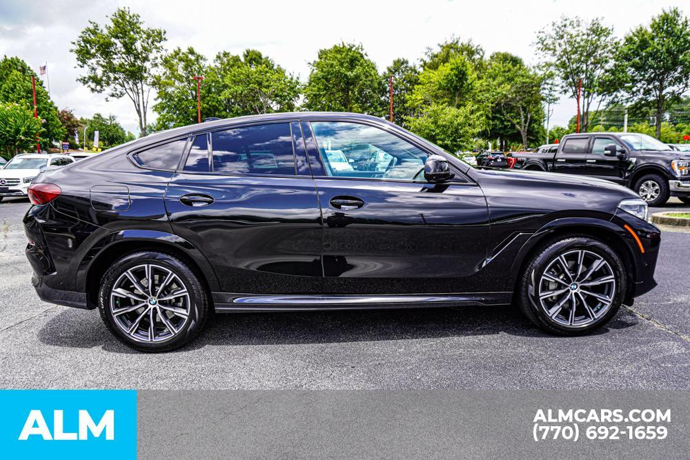 used 2023 BMW X6 car, priced at $53,920