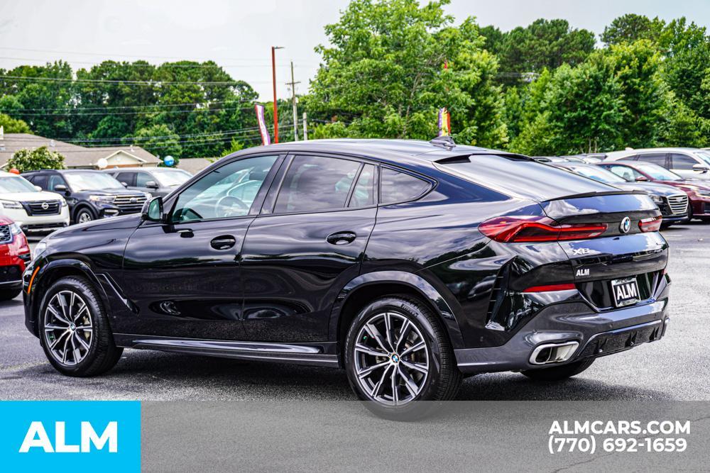 used 2023 BMW X6 car, priced at $53,920